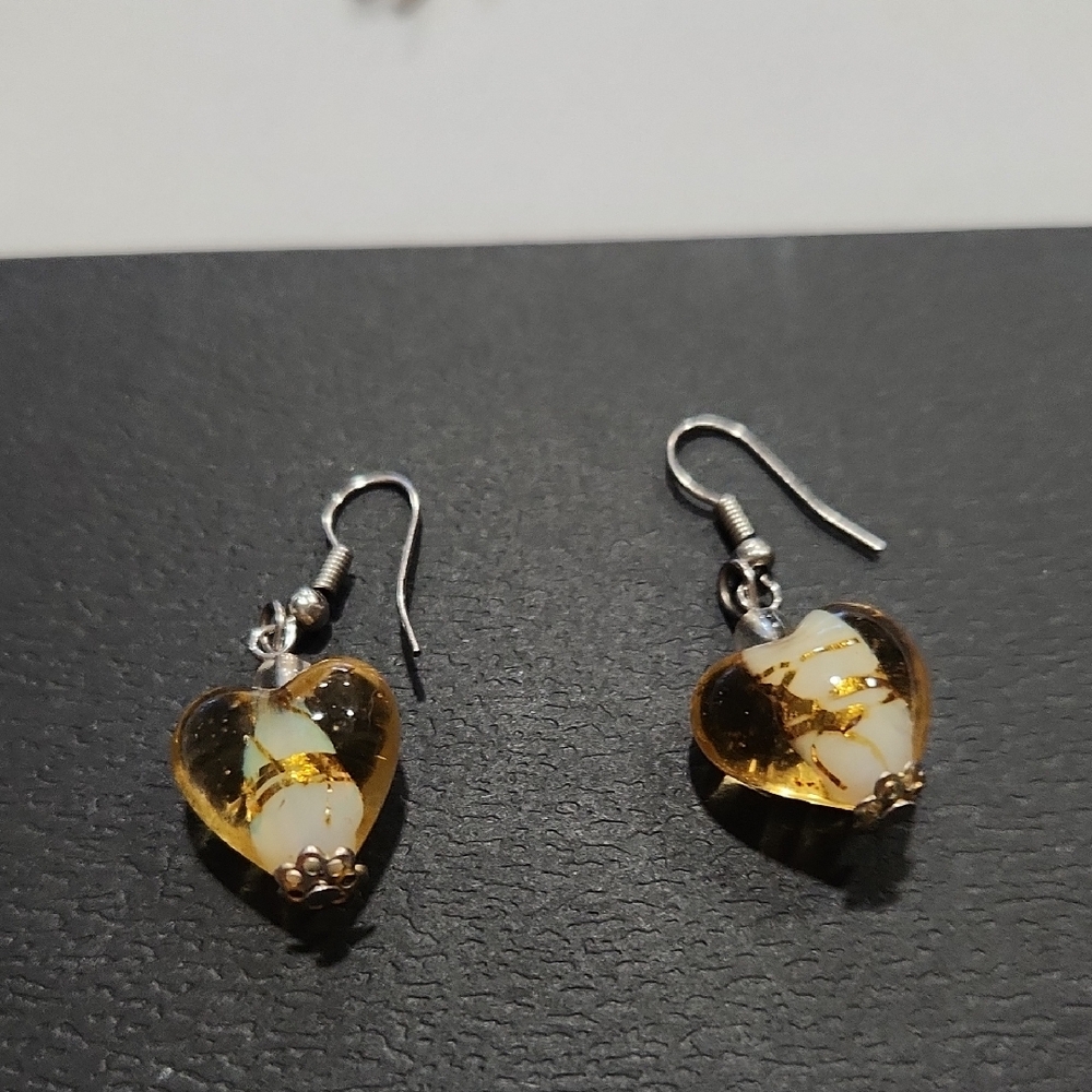 Gold Heart-Shaped Earrings with Intricate Patterns